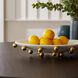 Katherine Ivory and Antique Brass Centerpiece